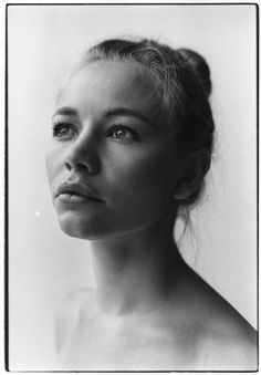 a black and white photo of a woman's face