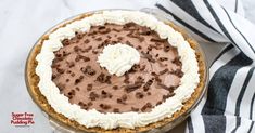 a pie with chocolate and white frosting on top