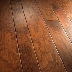 a wooden floor that has been cleaned and is brown