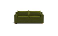 a green couch sitting on top of a white floor