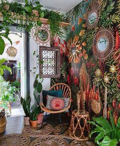 a room filled with lots of plants and decor