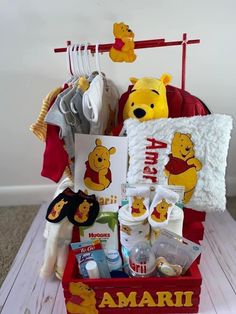 a winnie the pooh baby gift basket