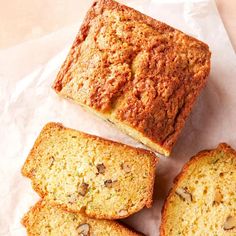 slices of banana bread sitting on top of white paper