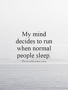 a person standing in the water with a quote on it that says, my mind decides to run when normal people sleep