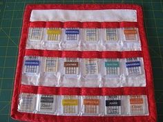 a red and white quilted table top with calendars on it