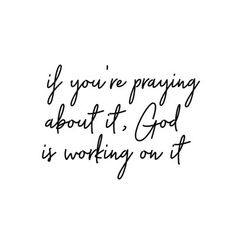 the words if you're praying about it, god is working on it in black ink