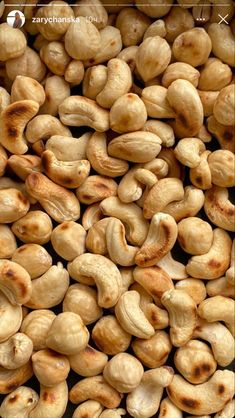 some nuts that are sitting on top of each other in the middle of a pile