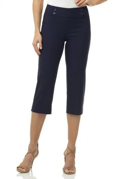 Do you sometimes wish you could enjoy the summers in a casual look, but think it may not be dressy enough for the office? These dressy straight leg capris are made just for you. They are roomy and comfortable enough to feel the soft breezes, and elegant enough to pair up with all your formal tops. Their chic details such as the pressed leg and nautical-inspired buttons add flair to your outfits, making them a summer must-have. Contoured waistband and back darts for perfect fit Tonal buttons at t Versatile Capri Length Pants For Summer, Stretch Cropped Leg Capris For Business Casual, Stretch Capris For Business Casual, Versatile Capri Length Bottoms For Workwear, Chic Cropped Leg Capris For Business Casual, Summer Solid Color Straight Leg Capris, Casual Knee-length Capris For Workwear, Casual Capri Length Pants For Work, Versatile Cropped Leg Capris For Summer