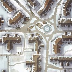 an aerial view of a snow covered area with several buildings and trees in the background