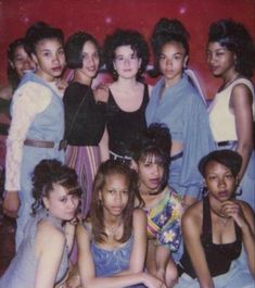 a group of young women posing for a photo