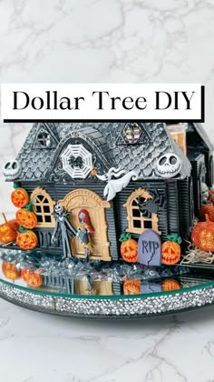 a halloween house with pumpkins and jack - o'- lantern decorations on it