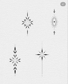 four black and white snowflakes on a white background