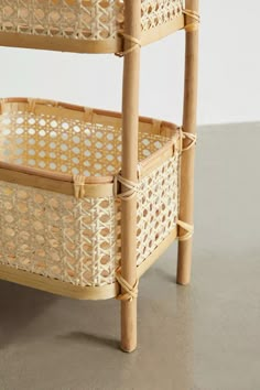 two wicker baskets stacked on top of each other