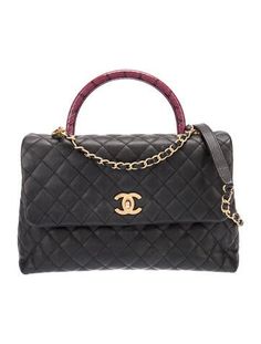 Chanel Top Handle BagFrom the 2018-2019 Collection by Karl LagerfeldBlackInterlocking CC Logo, Caviar Leather, Quilted Pattern & Chain-Link AccentGold-Tone HardwareRolled Handle & Chain-Link Shoulder StrapChain-Link Accents & Single Exterior PocketLeather LiningTurn-Lock, Flap & Snap Closures at Front Chanel Top Handle, Chanel Top, Coco Handle, Quilted Pattern, Cc Logo, Clothing Ideas, Handle Bag, Cross Body Handbags, Chain Link