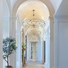 the hallway is clean and ready for guests to use it as an entrance way in this house