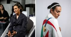 two women sitting next to each other in front of a white wall and one wearing a scarf