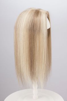 The 14-inch Brunette with Light Blonde Highlight Balayage Mono Top European Human Hair Topper, exquisitely crafted from 100% authentic European human hair. Known for its soft, fine quality, European hair stands out for its natural look and feel, making it exceptionally easy to match and blend with your own hair. This topper not only mimics the texture and delicacy of natural hair but also boasts a versatility that allows it to integrate flawlessly with your hairstyle, ensuring a seamless transit Blonde Highlight Balayage, Silver Blonde Ombre, Highlight Balayage, Blonde Ombre Balayage, Light Blonde Highlights, Celebrity Wigs, Blonde Highlight, Ash Blonde Balayage, Long Human Hair Wigs