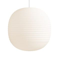 a white ball shaped light hanging from a ceiling fixture with a cord attached to it