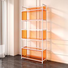 a white shelf with orange bins on it in front of a window and wooden floor