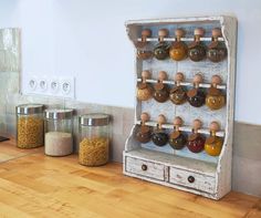 an old fashioned spice rack in the kitchen