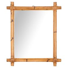 a mirror made out of bamboo sticks