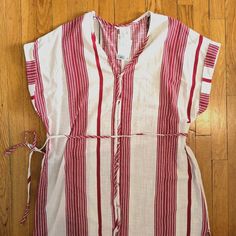 Perfect For Summer Maxi Dress! White With Red Stripes And A Tie At The Waist Line. Small Buttons Up The Front With An Extra Button Still On The Tags. The Dress Is 23 Inches Across When Laid Flat And Does Not Have A Shape To It So It Will Accommodate Many Sizes. 100% Cotton. Never Worn And Still Has Tags. Red Summer Dress For Daywear, White H&m Beach Dress, Red Summer Dress By H&m, H&m Red Summer Dresses, White H&m Dress For Beach, White Cotton H&m Dresses, H&m Cotton Dresses For Vacation, Striped Linen Dress, Animal Print Maxi Dresses