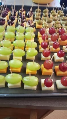 an assortment of appetizers on a tray ready to be served at a party