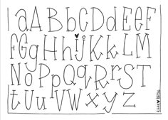 a handwritten alphabet with black ink on white paper