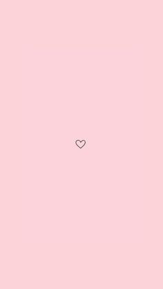 a pink wall with a heart drawn on it's side in the center and an arrow at the bottom