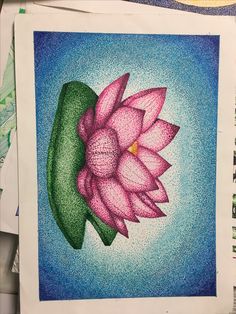 a drawing of a pink flower on top of a green piece of paper with writing underneath it