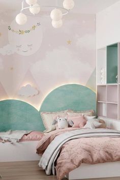 a bedroom decorated in pastel pink and mint green with clouds on the wall behind it