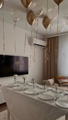 a long table with plates and silverware on it