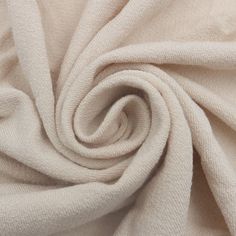 a close up view of a white fabric