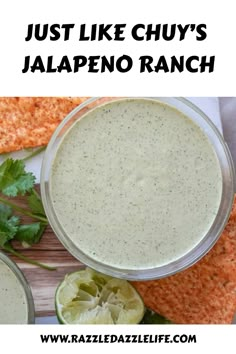 this is an image of jalapeno ranch in a bowl with limes on the side