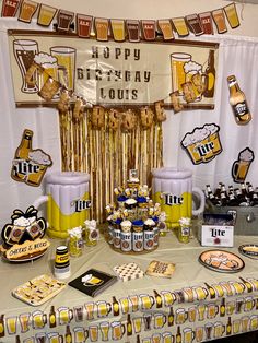 a beer themed birthday party with lots of food and drinks on the table, along with decorations