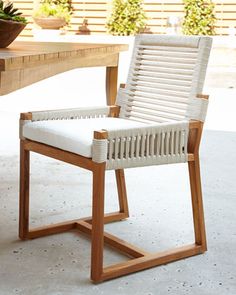 a chair sitting on top of a wooden table