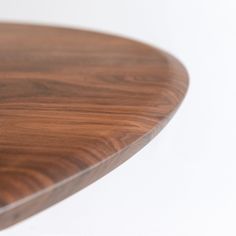 a close up view of the top of a table with wood grained material on it