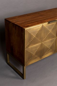 a wooden and metal cabinet with four drawers on one side, in the shape of squares