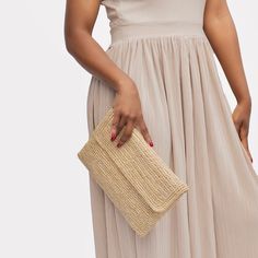 Depending on your style and the season, it is the accessory to ideally complete your outfit. It can be worn both during the day and in the evening and brings a dose of elegance to your looks. It's also a great gift idea to spoil your loved ones. Natural colored raffia pouch with a little gold touch, can be carried in the hand. -Closing with a flap with 2 snap buttons and a zipper -Cotton lining - Dimensions: 29 x 20 cm Elegant Woven Clutch, Elegant Summer Clutch Bag, Elegant Summer Clutch, Chic Evening Straw Bag, Elegant Handmade Natural Clutch, Chic Evening Straw Bag In Rectangular Shape, Woven Clutch For Evening, Woven Clutch For Party, Chic Rectangular Evening Straw Bag