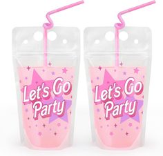 two plastic cups with pink straws and let's go party on them