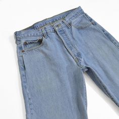 MEASUREMENTS Waist: 32" | High hip: 37.5" | Low hip: 43.5" | Thigh: 25" | Rise: 11.5" | Inseam: 29.75" | Leg opening: 8.25" LEVI'S 501 | 100% COTTON | early 2000s HIGH RISE | STRAIGHT LEG | BUTTON FLY | RED TAB  TAG SIZE W34 x L30 Best wash and subtle fading. Marks on legs. --Model photos not available on listings featuring only flat photos. Please refer to our other listings with model photos for examples-- SIZING -- still confused? Message us, we'll help! -- See all attached photos for sizing/condition notes. -- Colors may appear differently on other displays. -- No refunds. Items eligible for store credit only. -- All orders subject to our shop policies/FAQs. RESTOCKS | EMAIL.DETOURVINTAGE.COM SHOP MORE | DETOURVINTAGE.COM Flat Photo, Vintage Denim Jeans, High Hips, Levi's 501, Levis 501, Model Photos, Vintage Denim, Not Available, Levi's