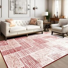 a living room with two couches and a rug