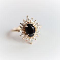 Enhance any look with this eye-catching oval black onyx halo ring from Lana. Perfectly complemented with a bold black hue, its elegant design and dramatic accents will add a touch of sophistication to any ensemble. CENTER STONE: Natural Black Onyx Gemstone Size: 8 x 6 mm / 1.3 ct. approx. Treatment: Heated Gemstone Origin: India ACCENT STONE: Choice of conflict-free Natural diamond, Lab-Grown diamond and Cubic Zirconia (CZ) Total halo diamond weight: 0.6 ctw. approx. SETTING: Choice of solid gol Rings Vintage, Pear Engagement Ring, Black Onyx Stone