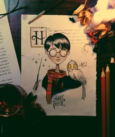 an instagram with a drawing of harry potter on it and some writing paper next to it