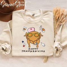 Show your gratitude and nursing pride with our Turkey Nurse Thanksgiving Shirt! This shirt combines the spirit of Thanksgiving and healthcare, featuring a delightful turkey nurse graphic and a comfortable fit. Whether you're working during the holiday or simply enjoying a turkey feast with loved ones, our Turkey Nurse Thanksgiving Shirt lets you embrace the season while showcasing your dedication to nursing in style and comfort. ♥ All items are made to order. ♥ Production & shipping time:  - Pro Thanksgiving Nurse Shirts, Thanksgiving T Shirt Ideas, Nurse Graphic, Gifts For Nurse, Elsa Shirt, Nurse Shirts, Turkey Shirts, Nurse Sweatshirt, Thanksgiving Shirt