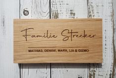 a wooden sign that says family streeter on it