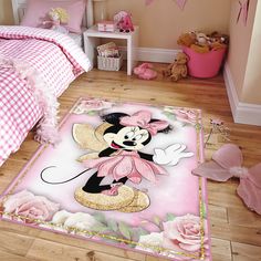 a minnie mouse rug on the floor in a bedroom