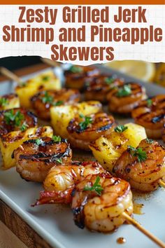 grilled shrimp and pineapple skewers on a white plate