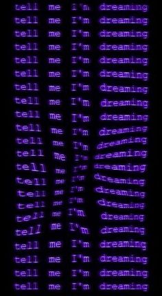 the word dream written in purple light on a black background with white letters and words