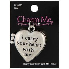 charm me i carry your heart with me pendant in silver tone on a black background